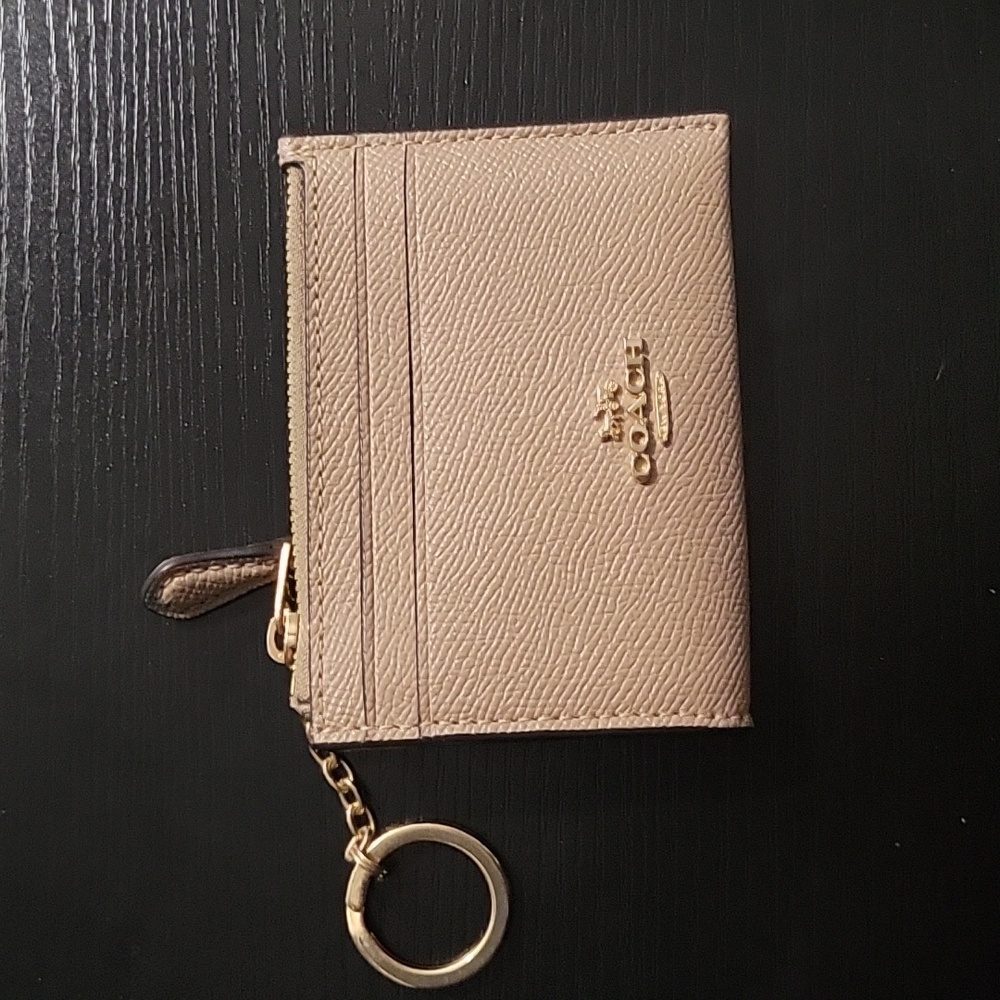 Beige Coach ID and coin wallet